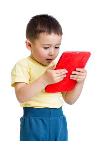 kid boy with tablet computer, early learning conceptionの写真素材