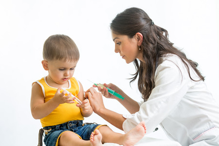 doctor injecting babyの写真素材