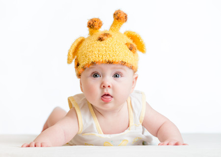 funny infant baby isolated on whiteの写真素材