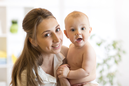Portrait of happy mother and babyの写真素材