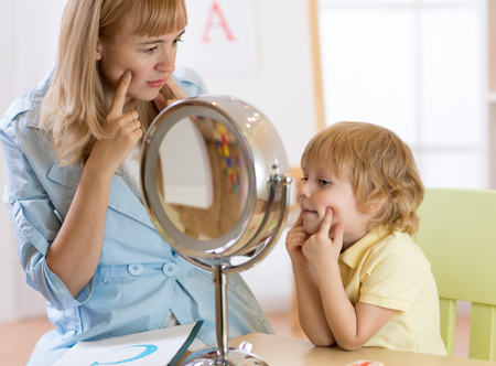 Cute child boy at speech therapist officeの写真素材