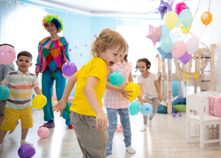Group of kids celebrate party fun togetherの写真素材