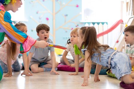 happy children and clown on partyの写真素材