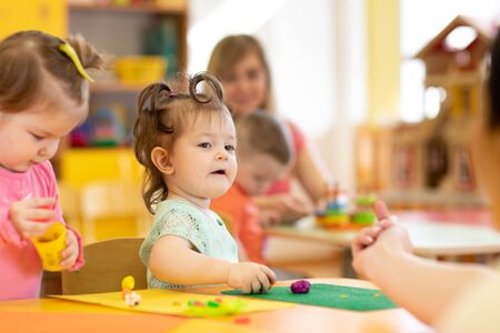 Children play colorful clay toyの写真素材