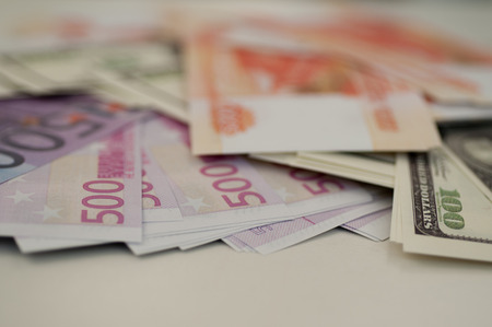 bank banknotes dollar, euro, ruble on a white background