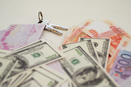 bank banknotes dollar, euro, ruble on a white backgroundの写真素材