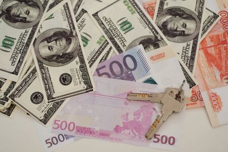 bank banknotes dollar, euro, ruble on a white backgroundの写真素材