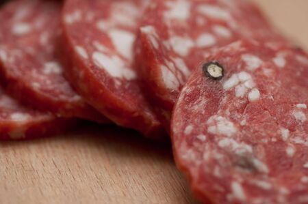 jerked Italian salami cut into pieces closeup