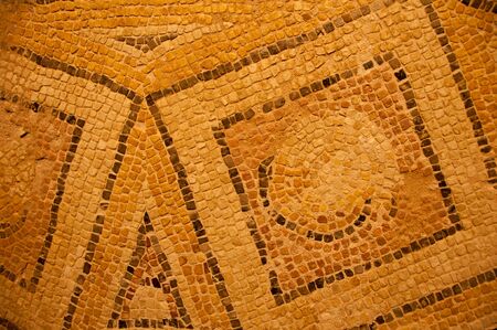 Ancient mosaic sand color close-upの写真素材