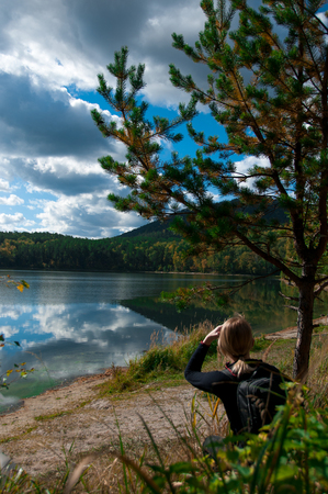 Tourist girl and beautiful autumn nature of the South Urals, Chelyabinsk region, Russia, Arakul Shikhanyの写真素材