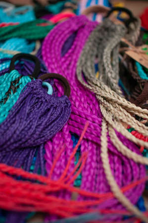 Colored braids on an elastic band for hair, accessory close-upの写真素材