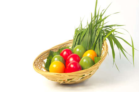 Colorful eggs in basketの写真素材