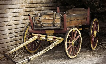 Autumn scene with wooden wagon