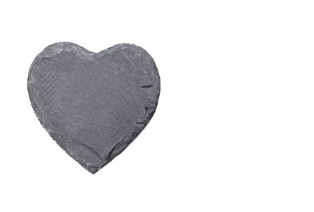Stone heart on white backgroundの写真素材
