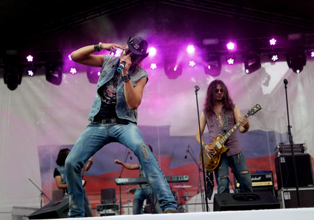 St. Petersburg, Russia - August 11, 2013: Concert band cover Harley Davidson on the celebration of the 100th anniversary of Harley Davidsonのeditorial素材