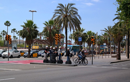 Barcelona, Spain - May 17, 2014: Tourists sightseeing on Segway tour of Barcelona, Spain