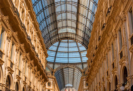 Milan, Italy - May 25, 2016: view of the glass roof and upper floors Galleria Vittorio Emanuele II. The gallery was designed by the architect Giuseppe Mengoni in the 1865-1877 biennium.のeditorial素材