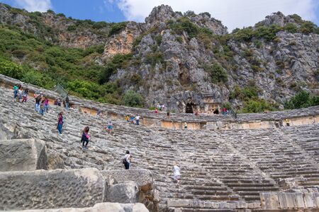 Demre-Myra, Turkey - April 26, 2014: The ancient Greek-Roman theater. Tourists walk on Teatron - places for spectators.のeditorial素材