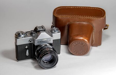 Gatchina, Russia - January 14, 2017: The old Soviet film camera Zenit. Photographed on a bright background.のeditorial素材
