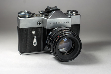 Gatchina, Russia - January 14, 2017: The old Soviet film camera Zenit. Photographed on a bright background.のeditorial素材