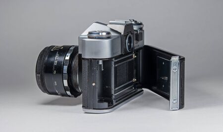 Gatchina, Russia - January 14, 2017: The old Soviet film camera Zenit. Photographed on a bright background.のeditorial素材