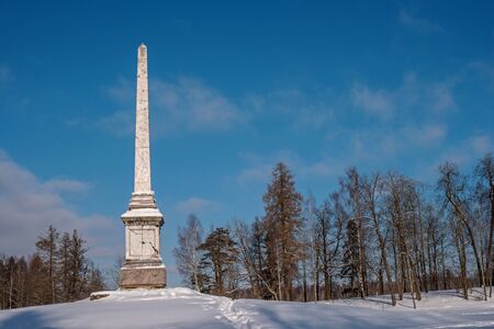 Chesma obelisk in Gatchina Park. Sunny winters day.の写真素材