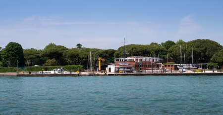 Venice, Italy - 07 May 2018: School of the navy flotilla -Francesco Morosini-. View from the Venice lagoon. In the photo you can see boats and yachts, where you can learn rowing and sailingのeditorial素材