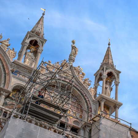 Venice, Italy-May 07, 2018: Architectural detail of Basilica San Marco, Basilica of San Marco - the Cathedral of Venice. On the roof of the Cathedral there are scaffolding and restoration works.のeditorial素材