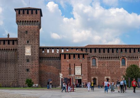 Milan, Italy - 09 May 2018: Sforza Castle. The castle was built in the 15th century by Francesco Sforza, Duke of Milan. Part of the courtyard. In the background is the monument to Leonardo da Vinciのeditorial素材