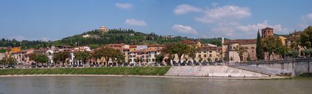 Verona, Italy - 06 May 2018: Panorama of the Adige River overlooking the Sanctuary of the Madonna of Lourdes. Verona, Italy. On the right is the church of Santo Stefanoのeditorial素材
