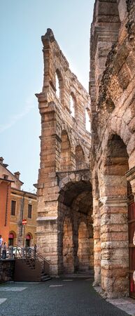 Verona, Italy - 06 May 2018: Side view of arches and details of famous ancient roman amphitheatre Arena di Verona, Italy, Europe. The amphitheater is on the square Braのeditorial素材