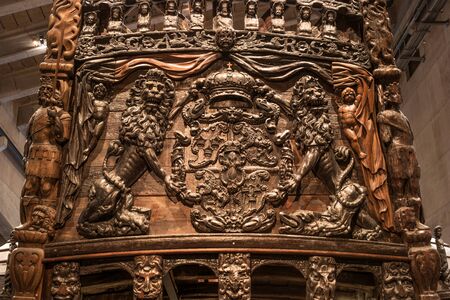 Stockholm, Sweden - April 20, 2019: Old sailing ship Vasa. Vasa Museum in Stockholm. Carved wooden decoration of the stern of the shipのeditorial素材