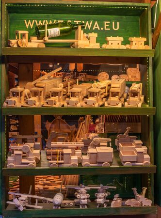 Tallinn, Estonia - January 3, 2020: Wooden cars, wooden toys at the Christmas market in Tallinnのeditorial素材