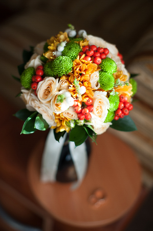 stylish autumn wedding bouquet on a dark backgroundの写真素材