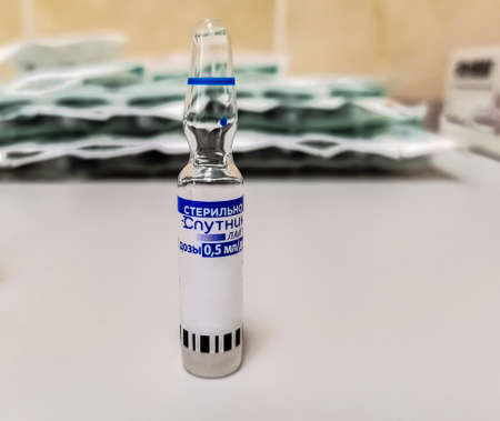 An ampoule Sputnik Lite vaccine is one of the variants of the Russian Sputnik V vaccine. Glass...