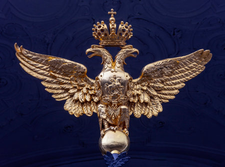 Sovereign double-headed golden eagle on the Main gate of the Winter Palace in St. Petersburg. 1850s....