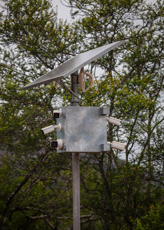 Complex of video cameras and motion sensors with solar panel and an antenna for transmitting signal...
