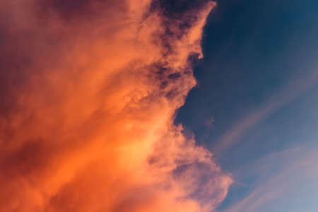 White and yellow storm front at sunset time with streams and clouds, right before thunderstorm. Dark...