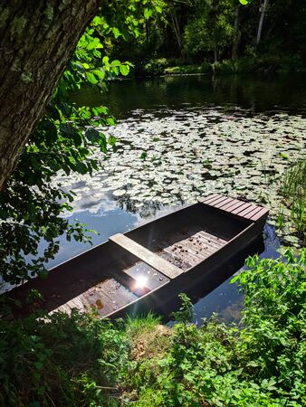 little rowing boat on the gartmpe river in franceの写真素材
