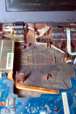 Cleaning of electronics from dust in interior of laptop の写真素材