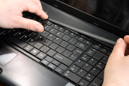  Untwisting of laptop の写真素材