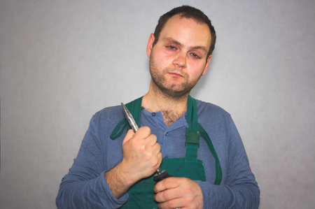 Man of worker and hammer drill の写真素材