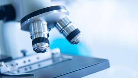 Microscope len closed up is scientific equipment in biology, chemistry, medical research  laboratory...