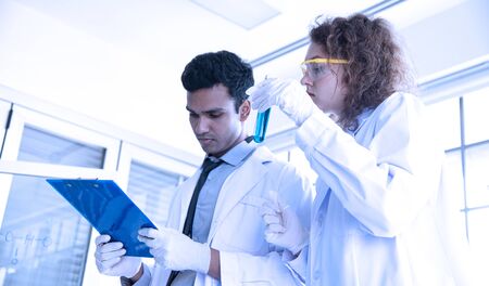Young scientists biologists in the lab