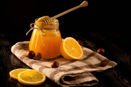 Honey with a black backgroundの写真素材