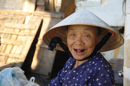 Unidentified woman gives a great black theethed smile on July 12, 2010 in Hoi An, Vietnam.のeditorial素材