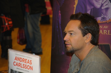 Andreas Carlsson from the Swedish Idol 2010 Jury signs copies of his new book Dandy at the book store Akademibokhandeln on November 20, 2010 in Karlstad, Swedenのeditorial素材