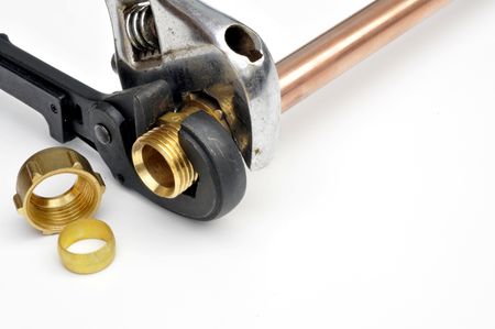 Wrenches on a compression fittingの写真素材