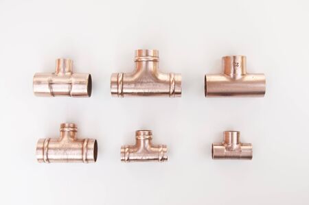 Different types of copper plumbing soldered tee fittingsの写真素材
