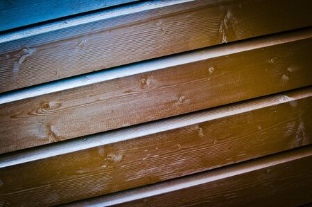 Brown stained wooden boards 
